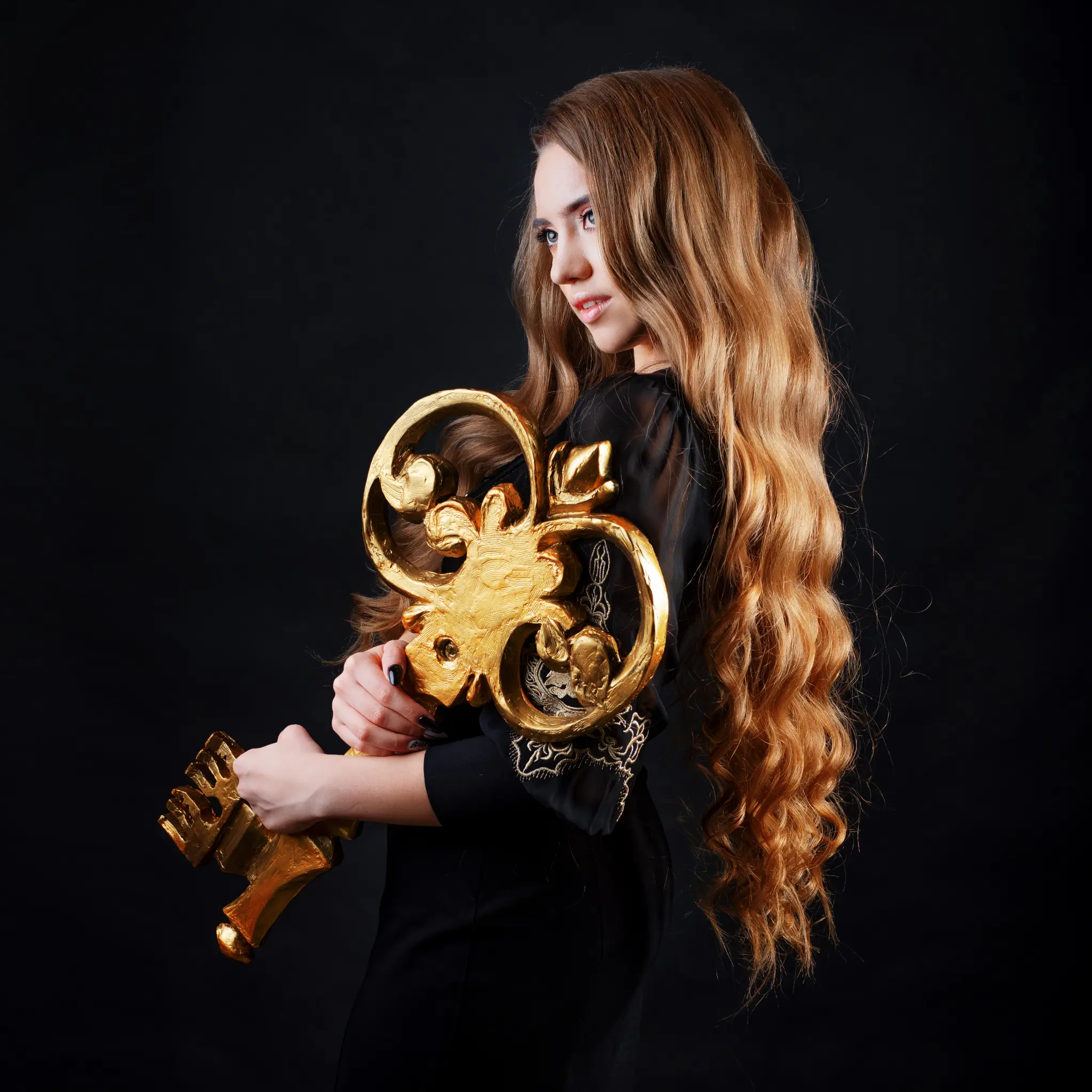 mysterious-blonde-with-golden-key-mystical-mystery-concept