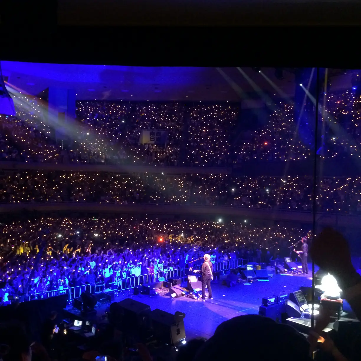 rear-view-musicians-performing-front-audience-nippon-budokan